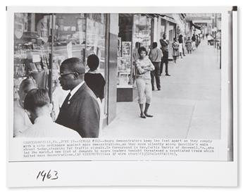 (CIVIL RIGHTS.) PHOTOGRAPHY. Group of 16 press wire service photographs from the decades of the civil rights struggle, the shooting of